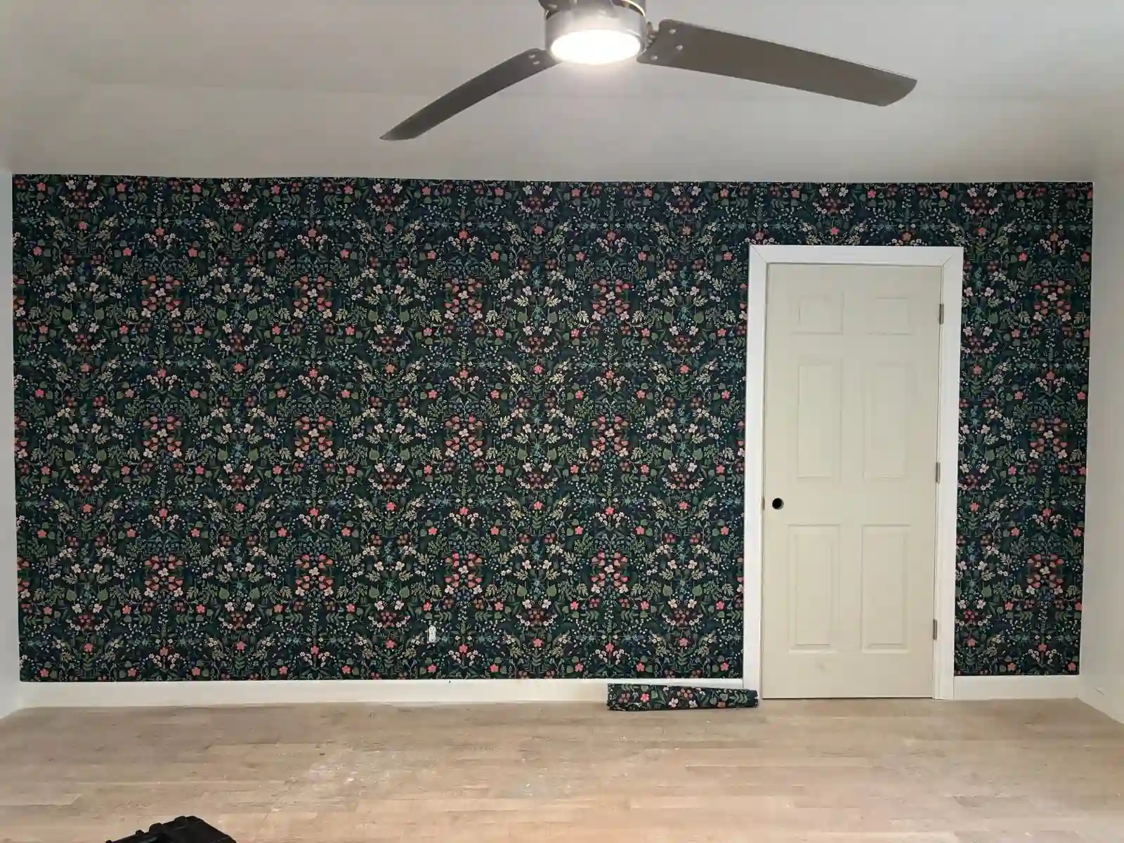 Historic Clovis home interior with restored wallpaper